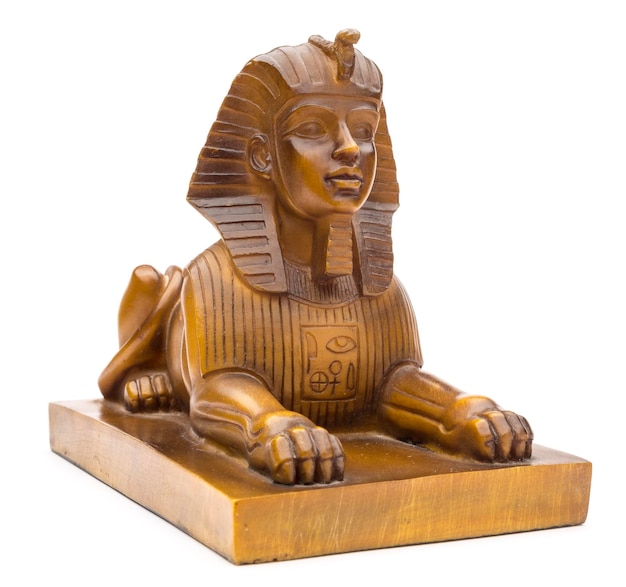 Figurine of a sphinx on a white background