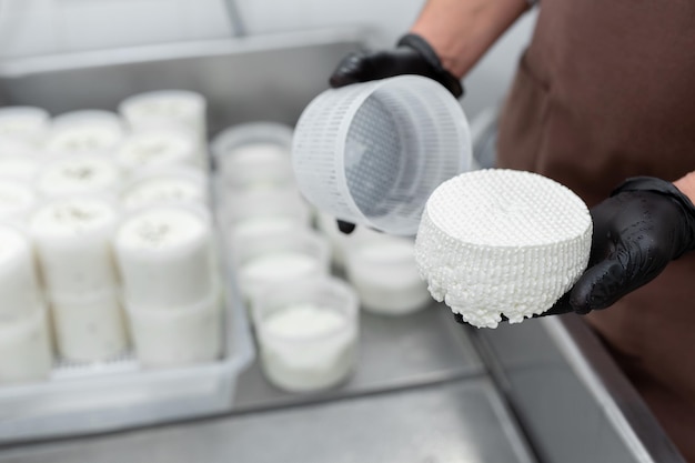 Filling molds for the production of soft cheese The cheese blanks are soaked in brine