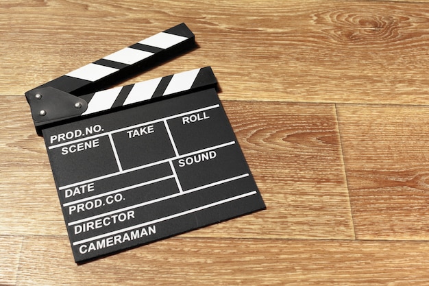 Film clapper board on a table