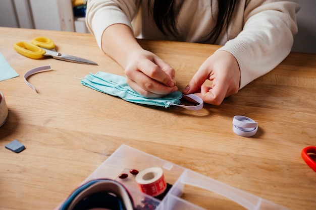 The final stage of medical mask sewing