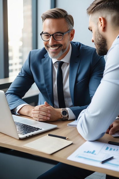 Photo financial advisor professional bank manager consulting business man working on laptop in office two busy happy businessmen partners talking discussing investment b2b project at office meeting