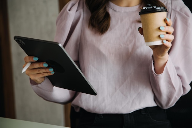 Financial analysts analyze business financial reports on a digital tablet planning investment project during a discussion at a meeting of corporate showing the results of their successful teamwork