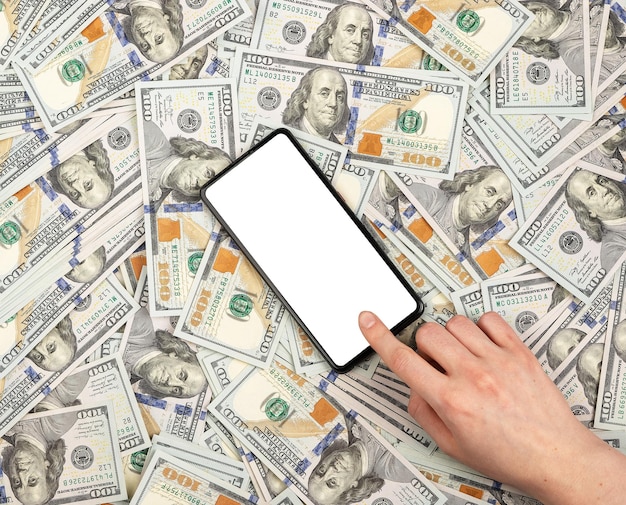 Financial phone mockup in hand over dollar heap pile Finance smartphone mockup