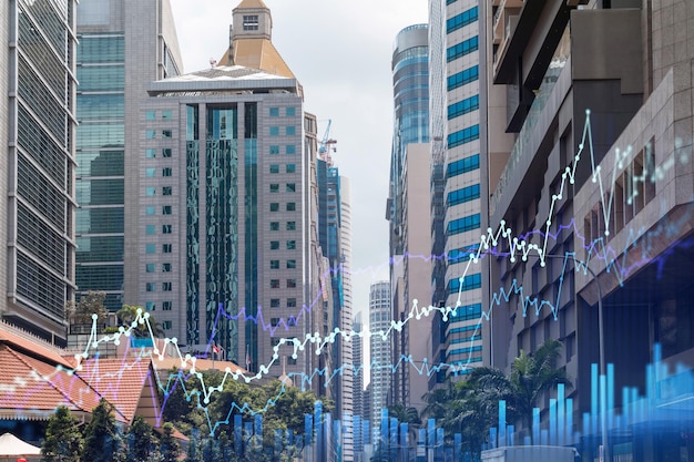 Financial stock chart hologram over panorama city view of Singapore business center in Asia The concept of international transactions Double exposure