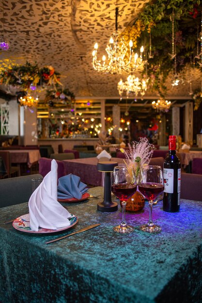 Fine Dine Restaurant Interior With Chandeliers And Table Settings