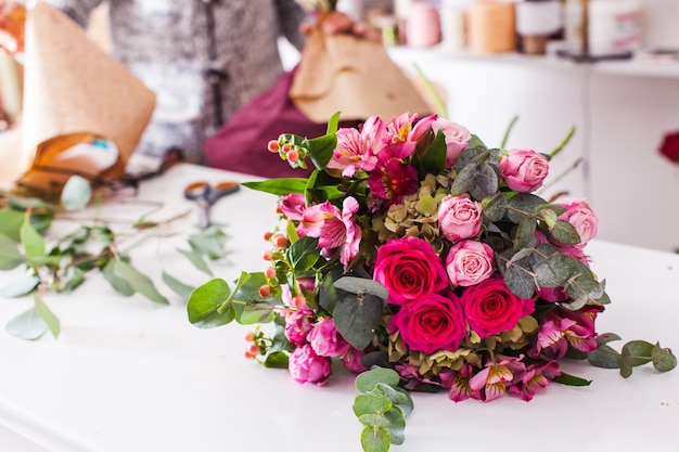 Finished bouquets on the table in the flower shop