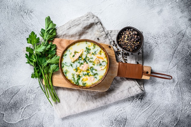 Finnish Creamy Fish Soup with Salmon and Potatoes. , top view.