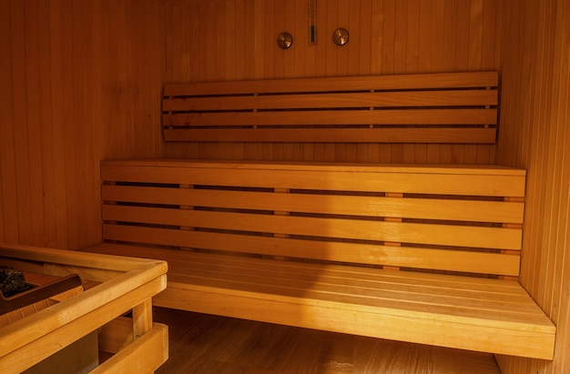 Finnish sauna interior finished with natural light wood