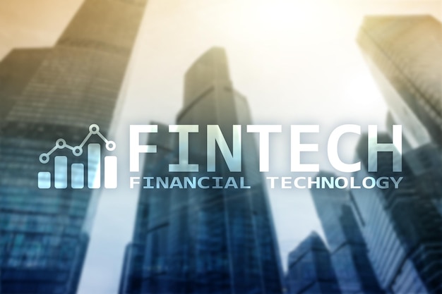 FINTECH Financial technology global business and information Internet communication technology Skyscrapers background Hitech business concept