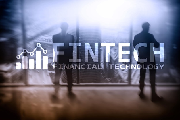 FINTECH Financial technology global business and information Internet communication technology Skyscrapers background Hitech business concept