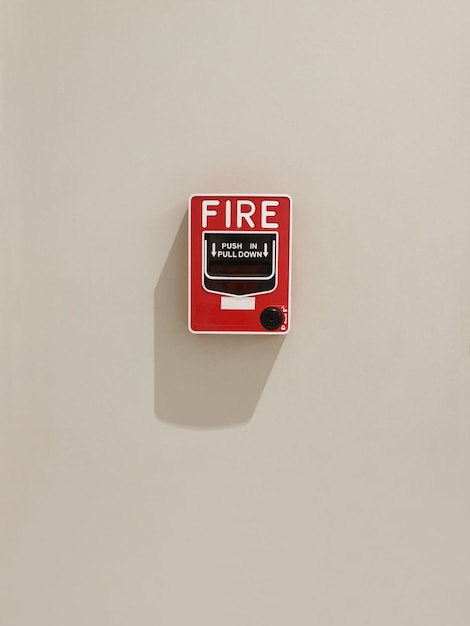 fire alarm system box installed on wall in building