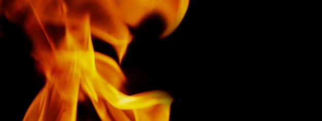 Fire background. Abstract burning flame and black background. represents the power of burning refers to heat spicy seductive sensual or burning fuels. fire incidents burning destroys everything.