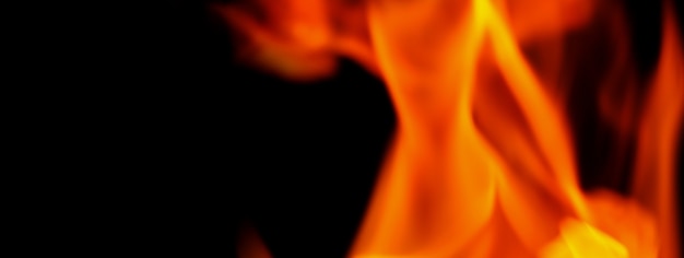 Fire background. Abstract burning flame and black background. represents the power of burning refers to heat spicy seductive sensual or burning fuels. fire incidents burning destroys everything.