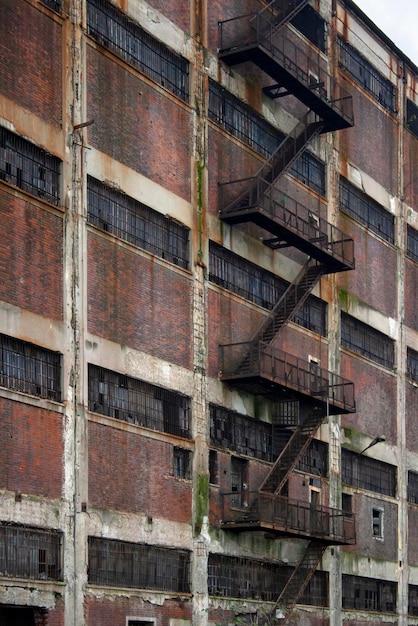 Fire escape in a brick building in Greece