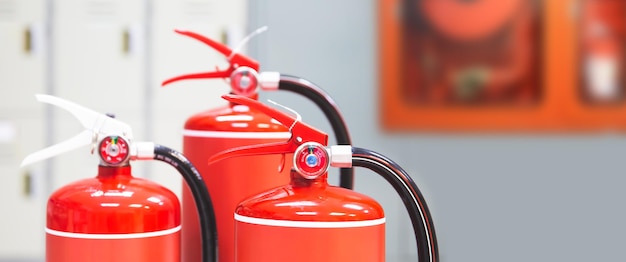 Fire extinguisher Closeup red fire extinguishers tank in the building for fire equipment for extinguishing or protection and prevent for emergency and safety rescue and alarm system training