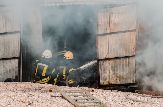 Fireman extinguishes fire