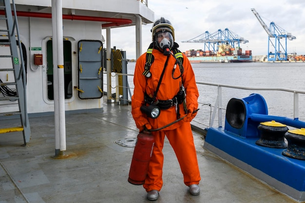 Fireman Fire fighting equipment Fire drill Seaman with firefighter’s outfits and Breathing apparatus