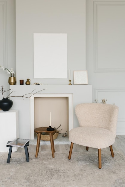 Fireplace armchair and mockup paintings in the living room of a Scandinavianstyle house