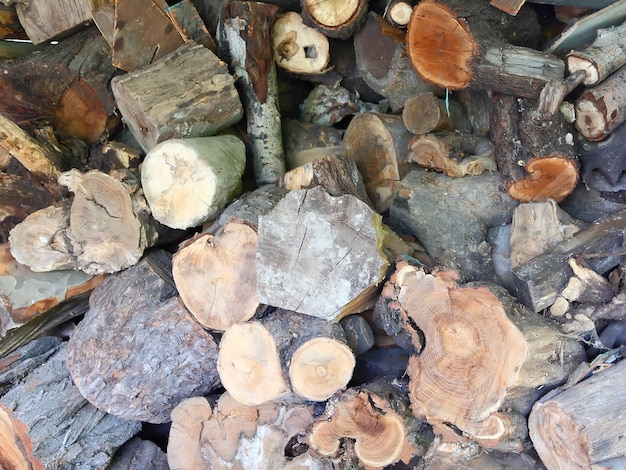 Firewood combined in a woodpile stack.