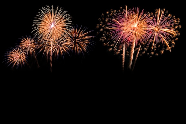 Firework display against black background