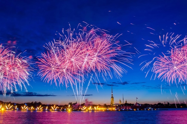 Firework on the Neva River near the Peter and Paul Fortress at night in the city of SaintPetersburg