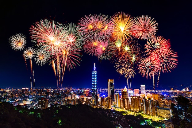 Fireworks over Taipei cityscape at night, Taiwan