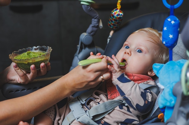 The first complementary food of a child at 6 months Broccoli puree baby