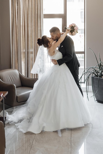 First look of wedding couple in the morning Wedding couple in the loft studio Bride and groom