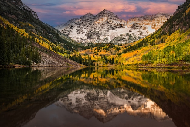 First morning light touching Rockie mountain at Maroon bell Maroon lake Aspen Colorado