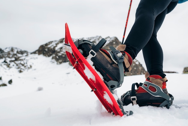 First plane of snow rackets in the mountain