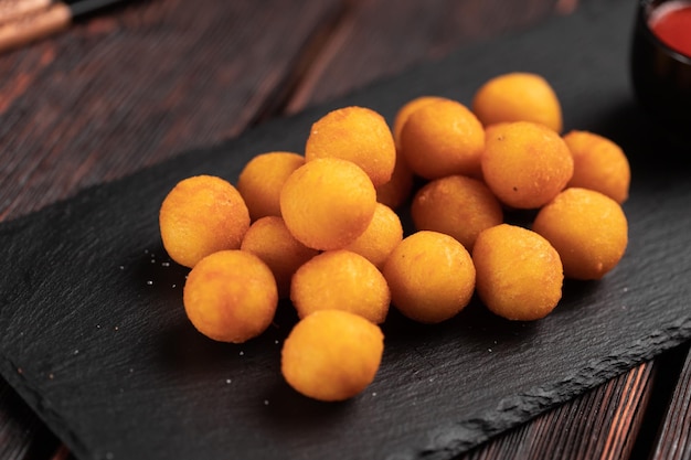 Fish balls in batter with chopsticks asian food