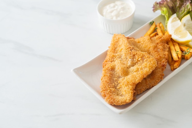 Fish and chips fried fish fillet with potatoes chips