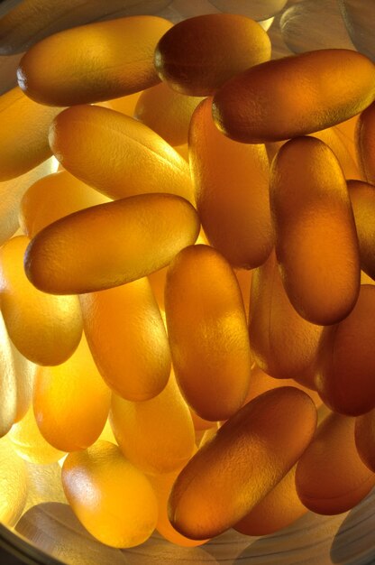 Photo fish oil capsules illuminated from below. close-up.