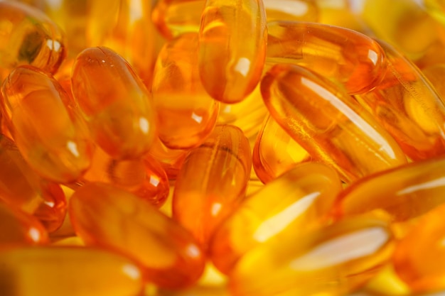 Fish oil or Cod liver oil gel in capsules with omega 3 vitamins supplementary healthy food xA