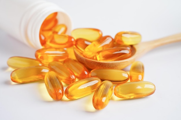 Fish oil or Cod liver oil gel in capsules with omega 3 vitamins supplementary healthy food