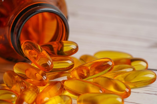 Fish oil or Cod liver oil gel in capsules with omega 3 vitamins supplementary healthy food