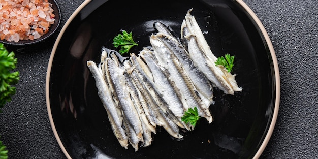 fish sardines fillet anchovy seafood meal food on the table copy space food background