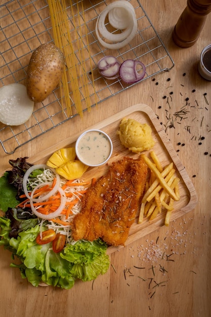 Fish Steak French Fries Mashed Potatoes and Sour Cream