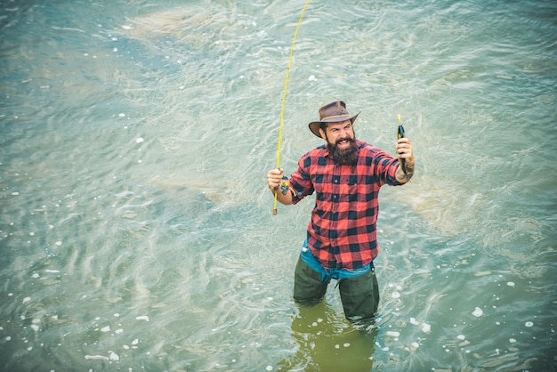 Fisher man fishing with spinning reel Fly fishing is most renowned as a method for catching trout an