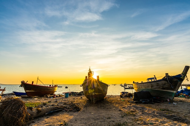 Fishing boat on beach in sunset at Bang phra Beach,sriracha chon buri,thailand