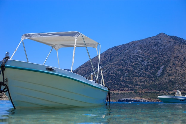 Fishing boat in the harbor of the Mediterranean close-up.