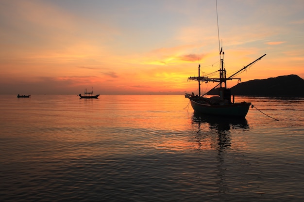 Fishing boat and sunrise 