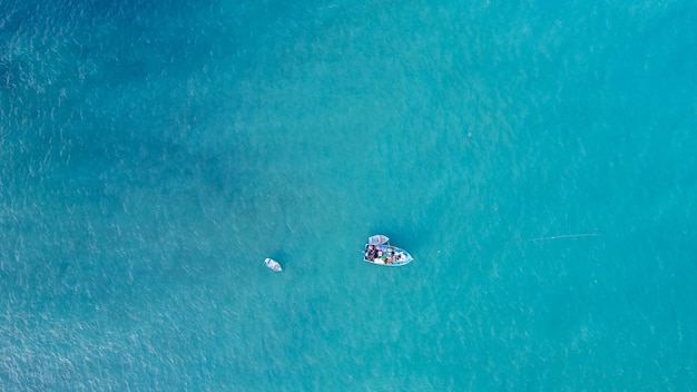 Fishing boat on the turquoise sea