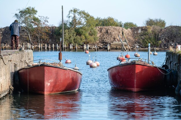 Fishing boats docked in the harbor channel