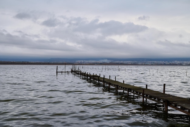 Fishing boats near wooden piers in an old fishing village in Varna Bulgaria