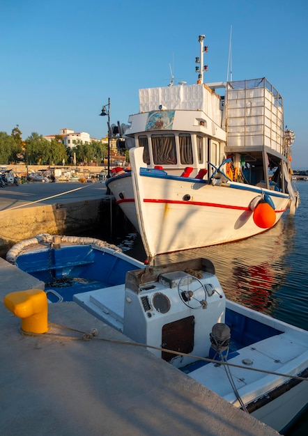 Fishing boats in the port of Loutra Edipsou on island Evia in Greece