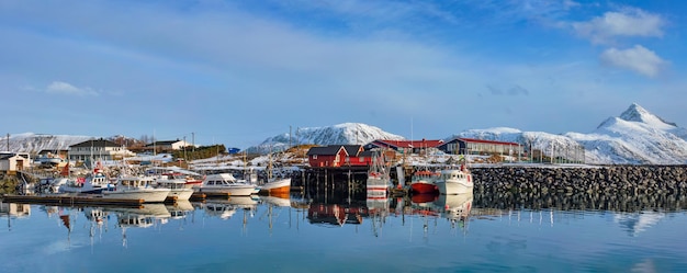 Fishing boats and yachts on pier in norway