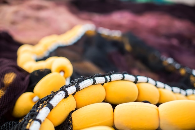 Fishing net and floats close up view Marine background