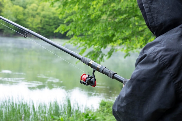 fishing rod in man hand