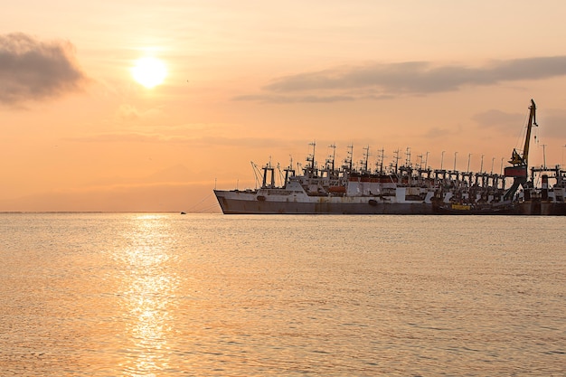 The fishing ships on a decline on a pier on Kamchatka